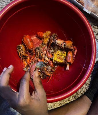 the crawfish is BLACK . i had to stop eating it because i thought i was tripping