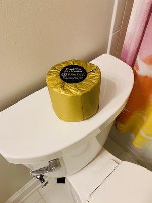 Golden roll of toilet paper left by the owner after the install was completed.