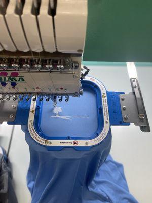 Polos being embroidered by Jupmode