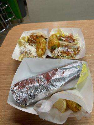 Shrimp burrito,Fish tacos and one potato taco.