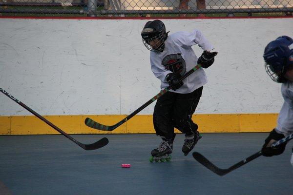 Youth Roller Hockey Kid - THE CAGE Roller Hockey Rink