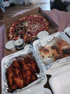 Half rigos combo Half meat lovers Spicy wings  Stuffed garlic rolls