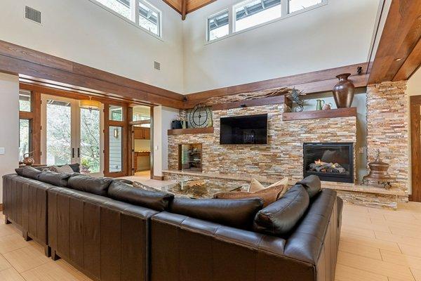 Sit, relax and enjoy this 5 ac lakefront estate.