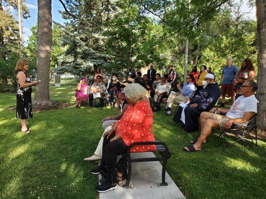 Jan Saeed offers a Bahai prayer at the Community Vigil.