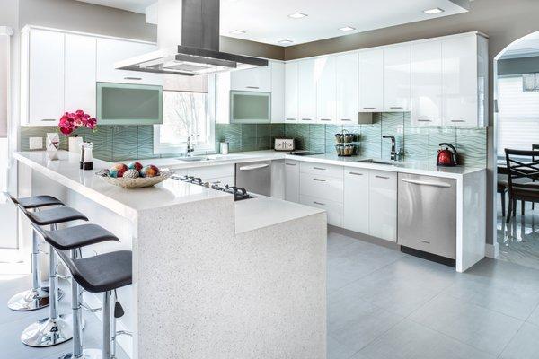 Modern cabinets. White quartz counter tops.