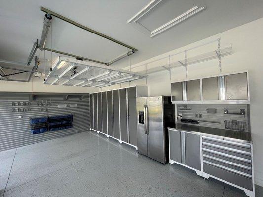 Motorized storage platforms, cabinets, shelving, slatwall, garage storage, organization