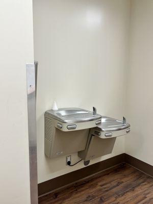 Water fountain by restrooms