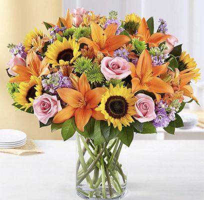 Middle mix arrangement of different flowers