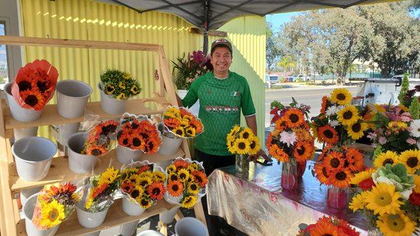 Owner Simon Gonzalez with his lovely sunflowers from Valley Center