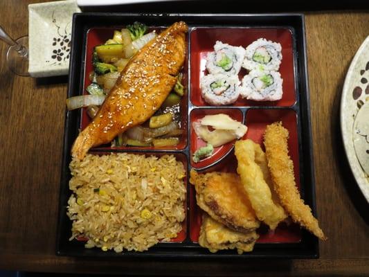 Bento Box - Salmon Teriyaki - chicken broth, house salad, shrimp & vegetable tempura, California roll, stir-fried veggies, fried rice.