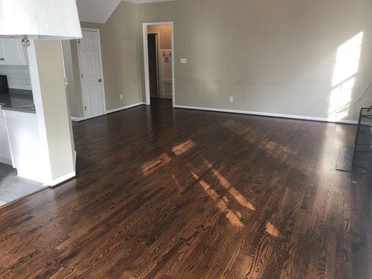 The wall on the left is the border of where the old floor was. They blended it seamlessly.