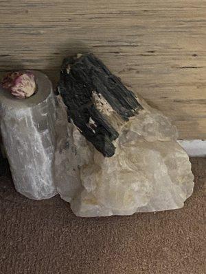 Large quarts with black tourmaline next to selenite.