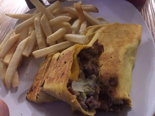 Surf and turf wrap. Steak, shrimp, scallops, lettuce tomato and fried onions with cheddar cheese and old bay mayo, grilled.