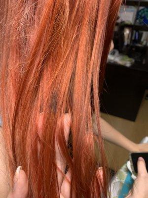 Uneven bleaching = hair color not properly sitting in.