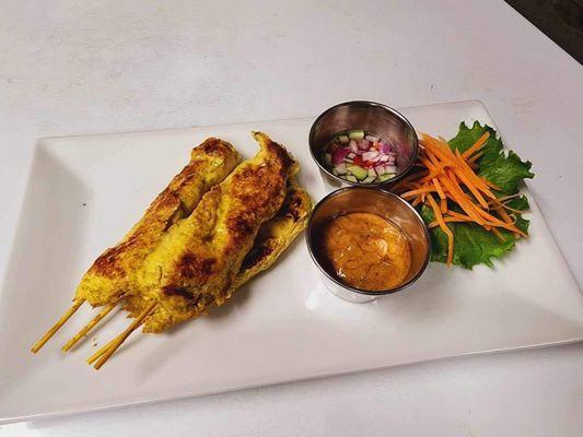 Chicken Satay with peanut sauce and cucumber dressing