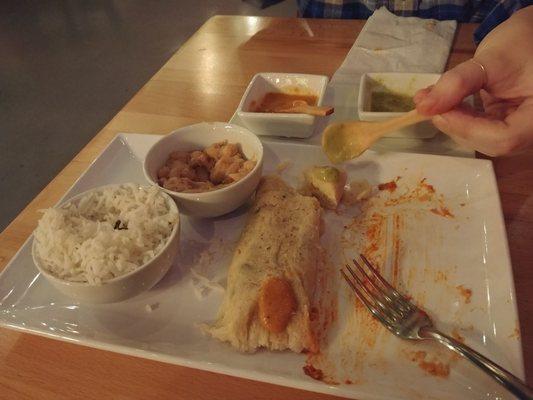 Squash tamale with rice and beans.