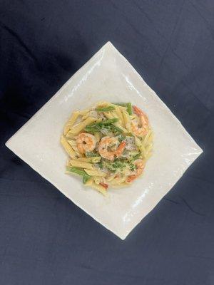 Artisan Made Shrimp Penne Pasta with a delicious withe wine sauce.