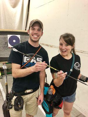 Cooper showing Heather how to Robinhood and arrow!