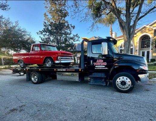 Towing a 1966 Chevy C10 Classic  for 24/7 Towing, Roadside, and antique transport call  Able Towing Cocoa 321-444-6379