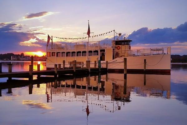 River Packet at sunset on the calm, reflecting Chester River.