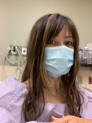 Getting ready for my procedure before putting on my hair net! Lol .