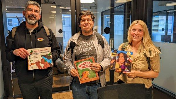 Students taking books home from our library.