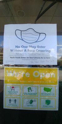 Clearly posted Covid19 precautions on the door, Dollar Tree Valrico