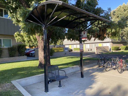 Bus stop in front of the complex