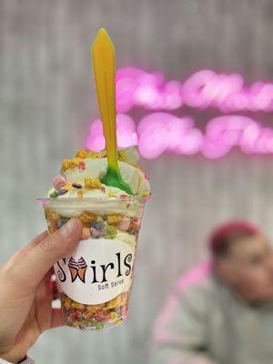 Vanilla ice cream with fruity pebbles cereal, captain crunch cereal & marshmallow cereal in a small cup!