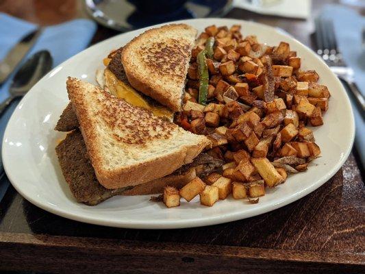 Scrapple, egg, and cheese breakfast sandwich