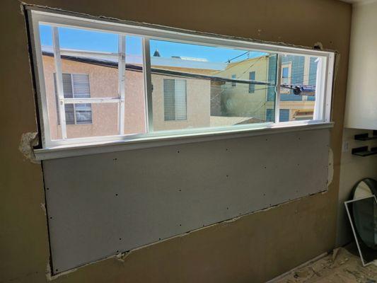 Build up of window for new kitchen with new nail fin vinyl windows Seal Beach, CA