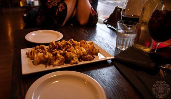 We ordered this appetizer of roasted cauliflower with cheddar cheese and bacon. It was really good. I ordered the shrimp scampi and she had