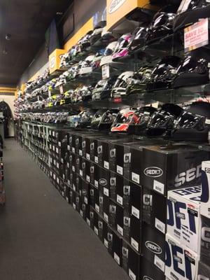 LOOOONG helmet wall. So much to choose from!!