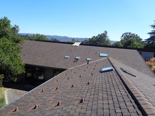 CertainTeed Landmark Tri-Laminate Shingle in Shenandoah with Velux Deck Mounted skylights and Solar Panel Stanchions