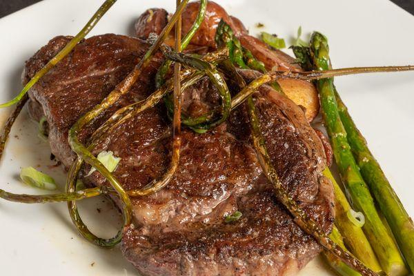 Grilled Ribeye! Cooked to perfection and served with a House made brown butter.