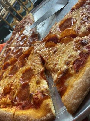 Large pepperoni and cheese pizza