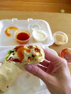 Yummy. Chicken wrap with mango habanero sauce from Wing Nutz. Ranch, and more mango habanero sauce on the side!