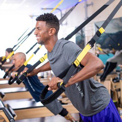 Created by a former Navy SEAL, the TRX® training system puts your Pilates body to the test.