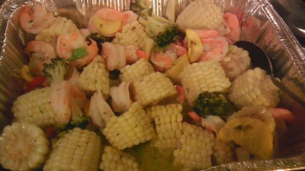 Bought frozen jumbo shrimp on sale, fresh corn, broccoli n misc. Veggies over Angel hair pasta