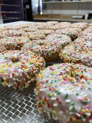 VANILLA SPRINKLED GLAZED DONUTS.