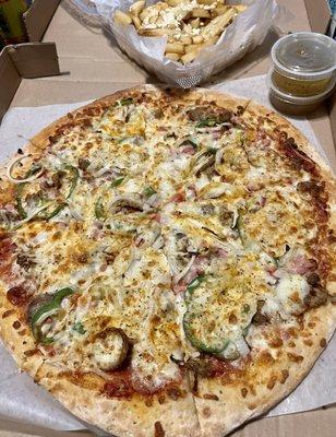 House specialty pizza with no mushrooms and Greek fries