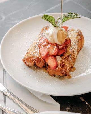 French toast with strawberries and syrup