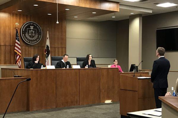 Founding partner Galia sitting alongside California Supreme Court Justice Chin and Superior Court Judge  Sullivan at 2017 Traynor Moot Court