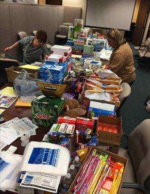 SIEBERT AGENCY Delivered food & supplies to local flood victims. Bill & Karen Siebert sand bagged local business.