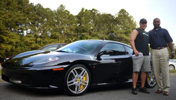 Sales Consultant Roger with client West, picking up his Ferrari F430!