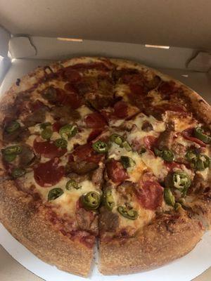 Pizza! All pepperoni and sausage! Half jalapeños! Loved the crust!