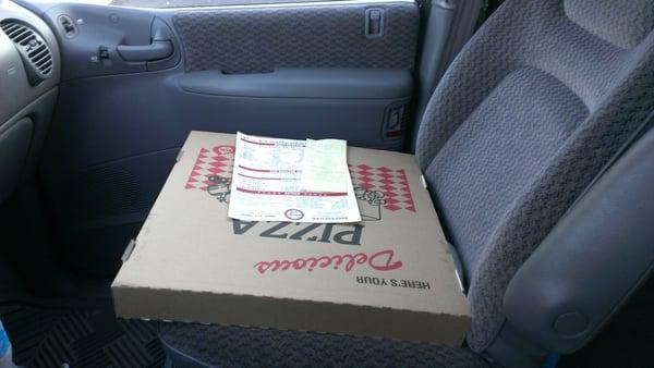 18" stuffed cheese pizza, bigger than my passenger seat.