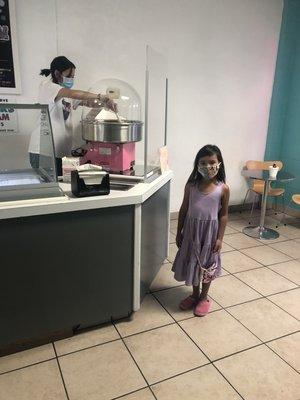 Our customer waiting for her cotton candy!