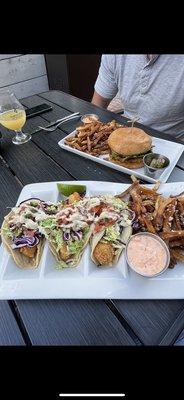 Fish tacos with truffles fries, burger with truffle fries