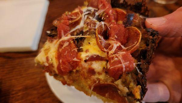 Meat Lovers (Detroit-style Deep Dish) Pizza: Each slice loaded with bacon, sausage, and pepperoni